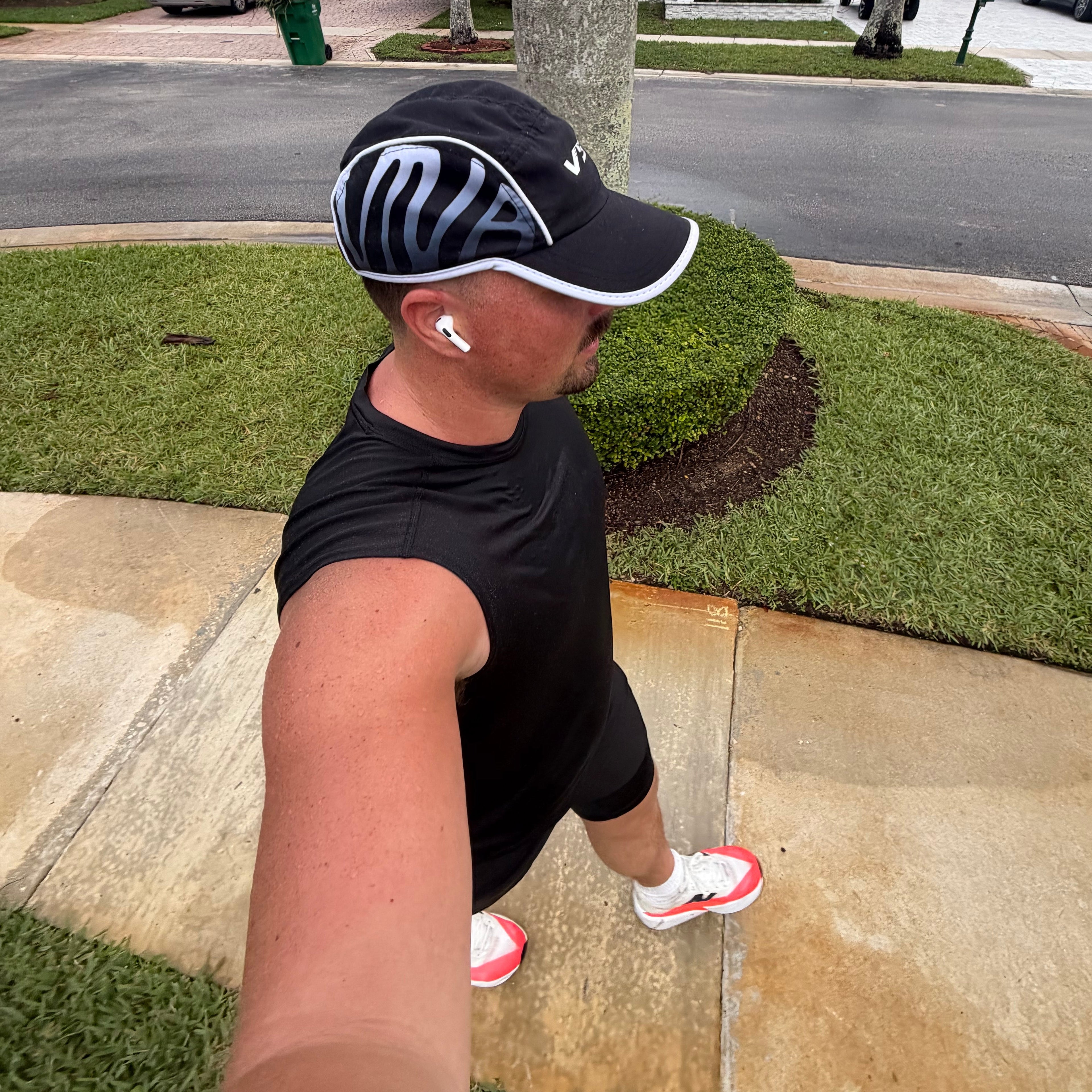 Person taking a selfie with the distance hat on