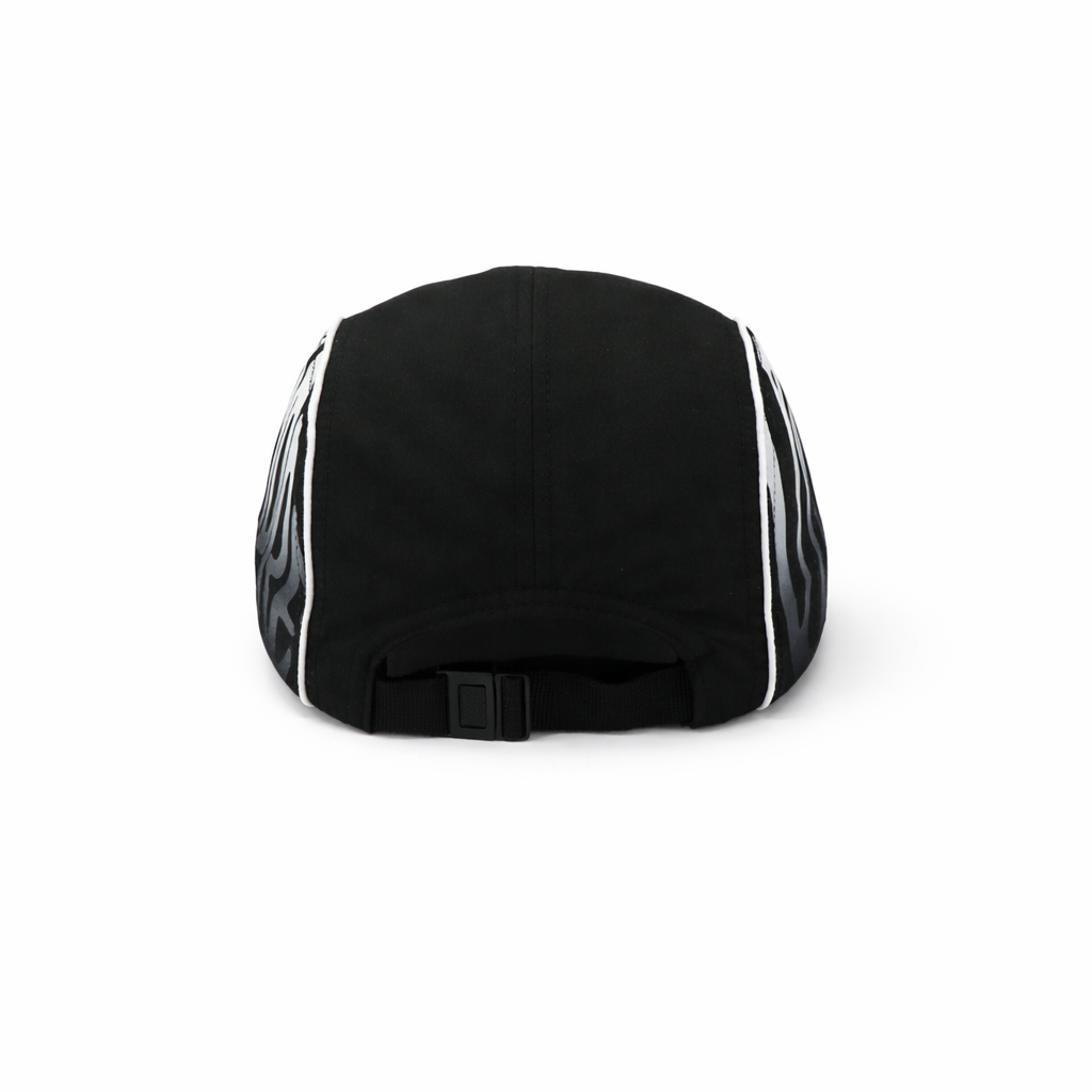 Black cap with white patterns on a white background