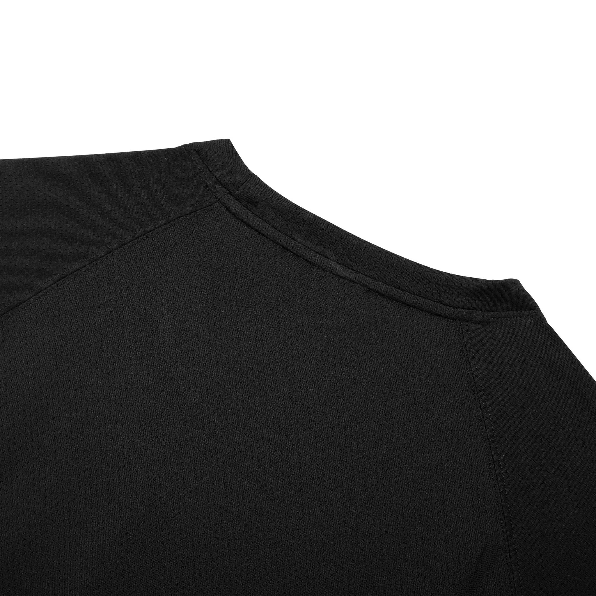 Close-up of a black top on a white background