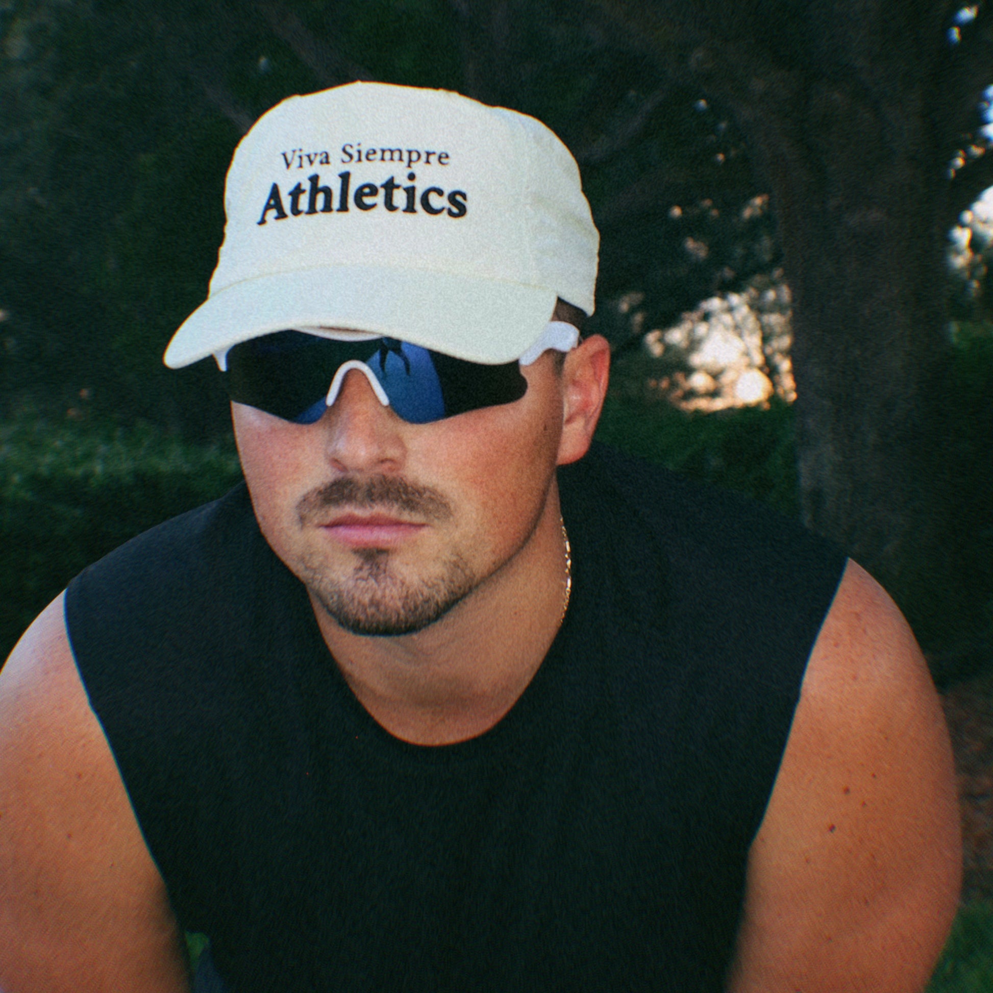 Runner wearing Viva Siempre Restart Hat Bone White outdoor lifestyle