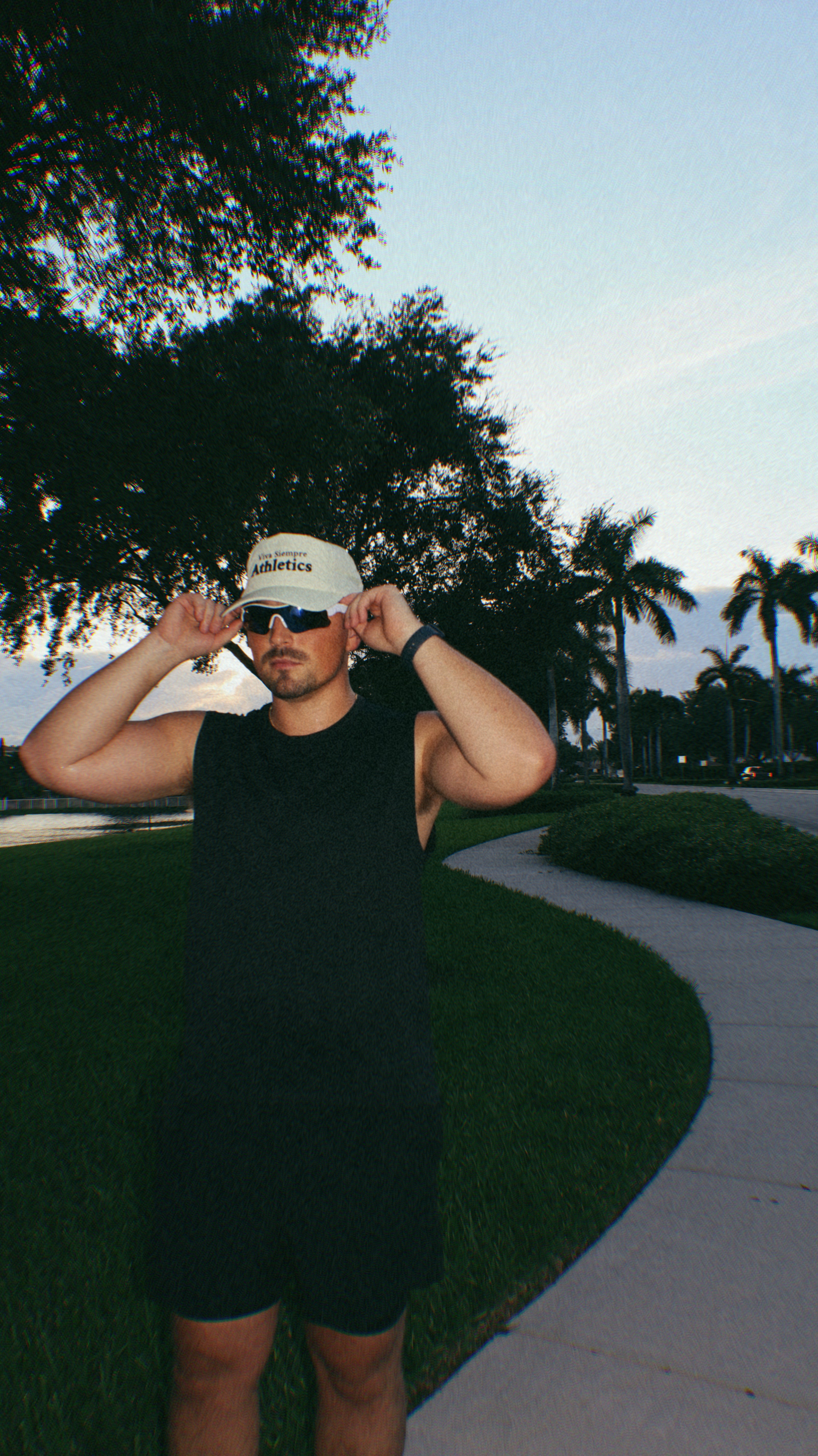 Runner Wearing Viva Siempre Hat